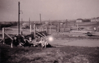 With siblings by the Bohdalec barricade, May 1945