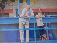With grandson Petr, 2025