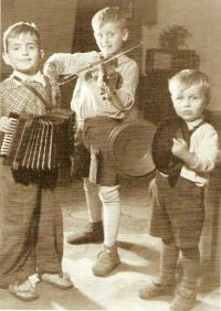 S. Karásek as a boy, playing with his brothers
