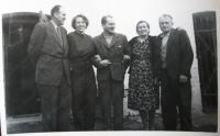 With parents and friends in 1960