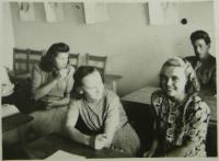 L.CH. on right side - after war during the finishing of her high school.