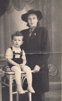 With his mum; 1945