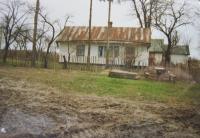 A house belonging to the Valeš family in Černý Les, Volhynia. Photographed in the 1990s