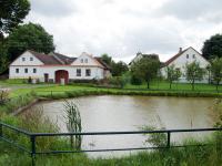 Houses no. 12 and 13  by the village pond in Vřesce