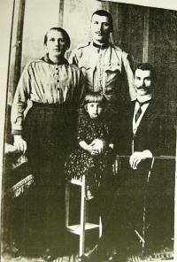 with parents, father in the middle