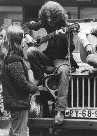 Zorka Růžová, Jaroslav Hutka and Petr Kalandra in an off-road car for travelling concerts in Prague, 1968
