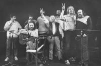 A performance in Wroclaw in 1989; from the left: Pavel Dobeš, Pepa Nos, Jaroslav Hutka, Petr Dopita, Karel Kryl, Petr Rímský, Jarek Nohavica, Vladimír Veit, and Pepa Streichl