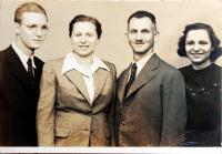 With her parents and brother after the war
