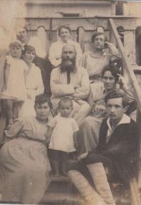 Historical photo, his mother Marie in the front