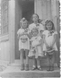 Kristina, the smallest in the middle, on the feast of God's body with Polish little girls from the neighborhood, Wola Michowa, 1945