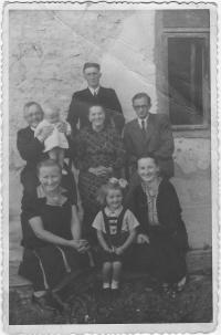 Kristina with her parents, uncles, aunt, grandmother and little cousin, Vydraň, July 22, 1946