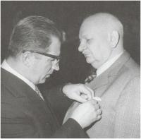 Father Vilém Nový receiving an award from the Prime Minister Lubomir Štrougal, 1984