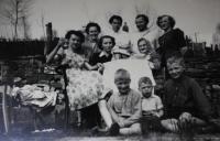 Anita with her family visiting Kraslice in 1956 (Anita holding a glas, Anita´s granny wearing a shawl)