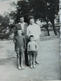 With his wife and children