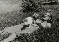 Jan Frolík with his neighbour´s cat in Rudník near Vrchlabí in 1982