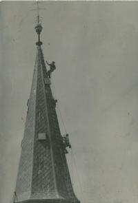 Vlastimil Bartos during the repair of the church roof in 1980s