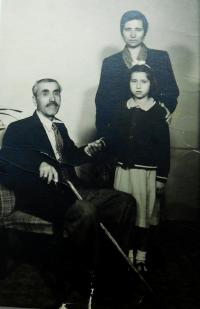 Grandfather Andreas Tcapas with her mother and sister witness
