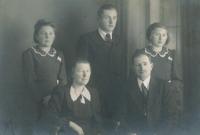 With parents and siblings