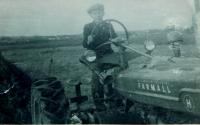Milan Hlobílek at the Farmall tractor in 1945