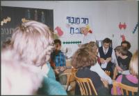 Mikuláš in the white kipa celebrating Chanuka at the Lauder Schools, Prague about 1998