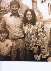 With her husband and daughters in the late 1970s 