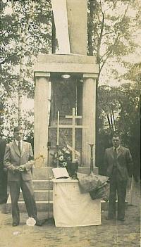 The original cross on the tomb after the burial of the burned and shot victims of Bohemian Malin