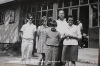 His whole family in front of a mountain hut in Herlíkovice 