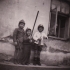 Children in Nýrsko after the war (Johann with the hatchet)