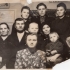 family photo of Kostelni family - from left to right: 3rd row: Anna (from Kostelni house, the narrator's sister), her husband - Dmytro Kish, sister Mariya Kostelna; 2nd row: neighbor, Mykhailo - father of the respondent, respondent, mother Kateryna (from Dembitski house), son of Hanna and Dmytro sitting in her arms; 3rd row - sister Ivanna Kostelna. Yuzhnaya mine, Prokopyevsk, Kemerovo region