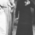 Vladimír Kaiser, standing right, greets a group of archive science students in Kadaň with a colleague, both wearing theatre costumes, 1981